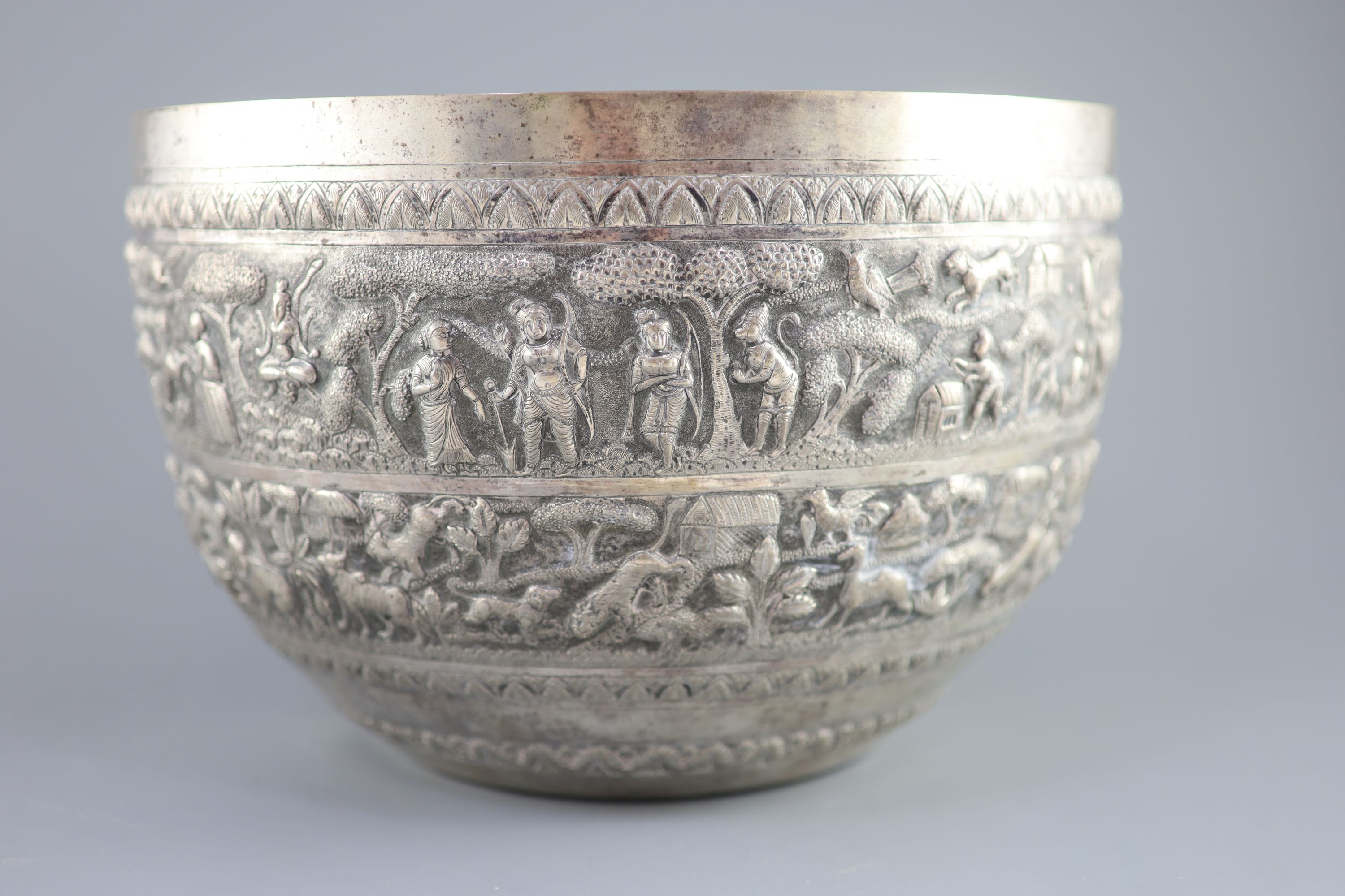 A large late 19th century Indian export embossed silver bowl, diameter 31.2cm, height 20.1cm, 36oz.